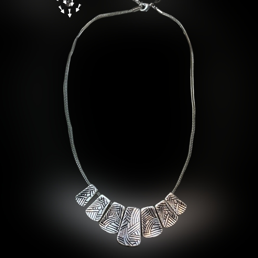 Tribal Pattern Silver Tone Reversible Necklace Tribal Pattern Silver Tone Reversible Necklace